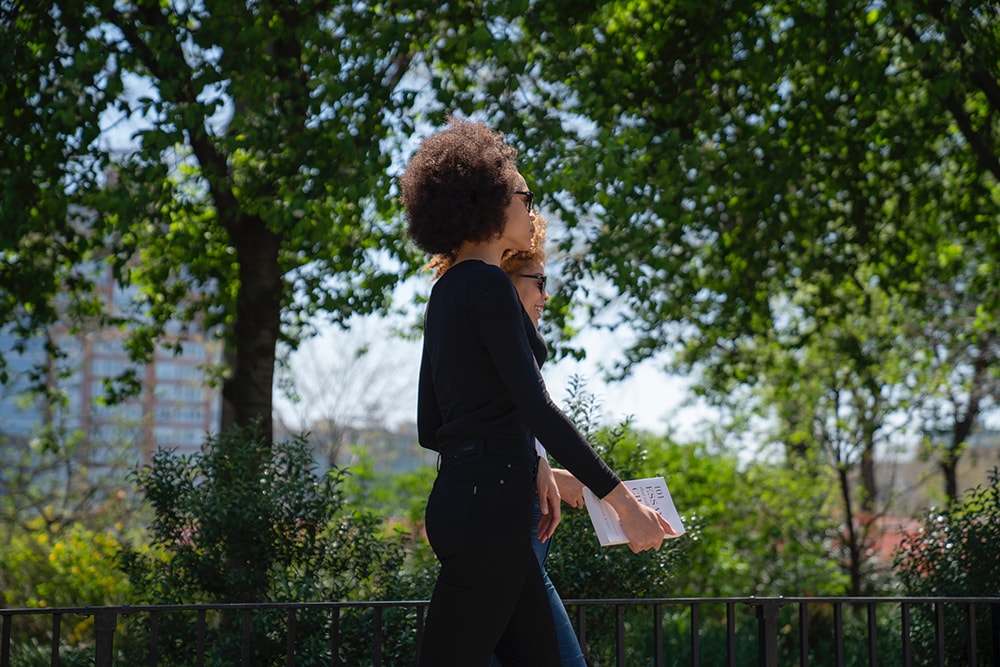 student walking in park